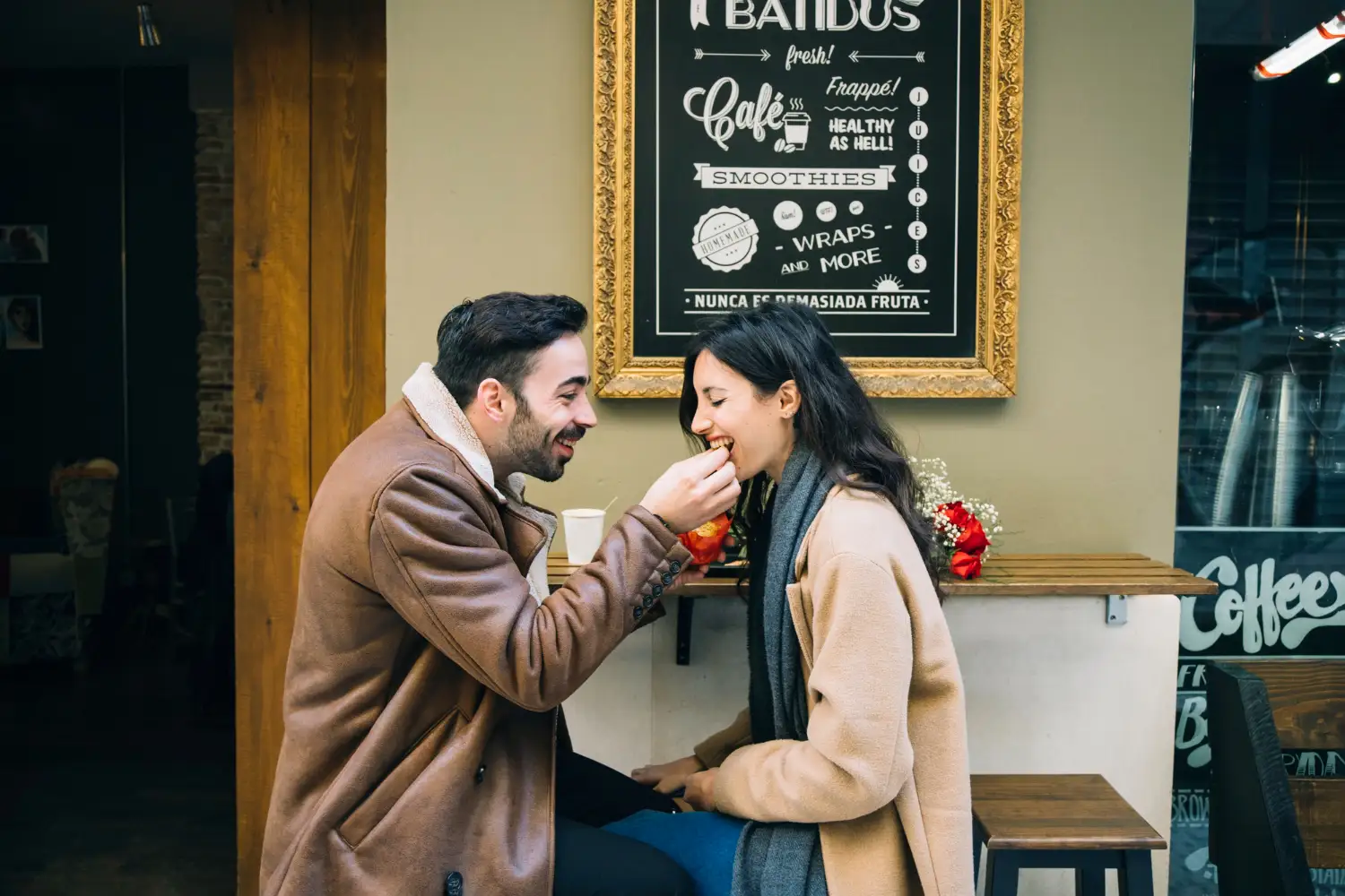couple having intimate celebration in a cafe
